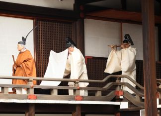 Japan's Emperor Akihito leaves after a ritual to report his abdication to the throne