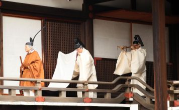 Japan's Emperor Akihito leaves after a ritual to report his abdication to the throne