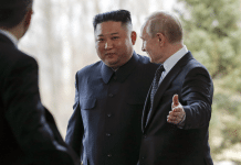 Russian President Vladimir Putin, right, welcomes North Korea's leader Kim Jong Un