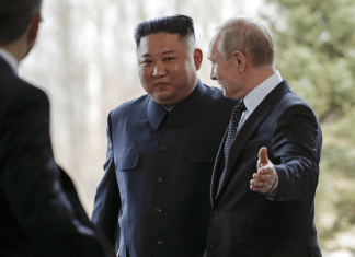Putin meets with Kim: Hopes to help resolve nuclear standoff Russian President Vladimir Putin, right, welcomes North Korea's leader Kim Jong Un