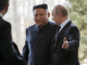 Russian President Vladimir Putin, right, welcomes North Korea's leader Kim Jong Un