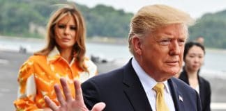 Did Trump just admit Russia helped him get elected? President Donald Trump and his wife Melania Trump