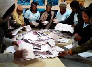 Electoral commission agents start counting the votes in Wednesday May 8, 2019 general elections in Johannesburg, South Africa
