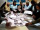 Electoral commission agents start counting the votes in Wednesday May 8, 2019 general elections in Johannesburg, South Africa