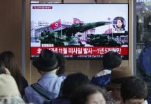 A TV broadcast in Seoul, South Korea, showing file footage of North Korea’s missiles on Saturday. North Korea fired several unidentified short-range projectiles off its eastern coast.