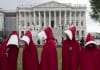 Supporters of Planned Parenthood dressed as characters from "The Handmaid's Tale,"
