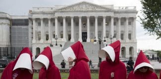 Supporters of Planned Parenthood dressed as characters from "The Handmaid's Tale,"