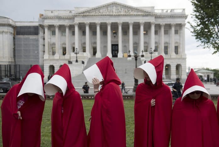 Supporters of Planned Parenthood dressed as characters from 