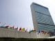 The flags of member nations fly outside the General Assembly building at the United Nations headquarters in New York.