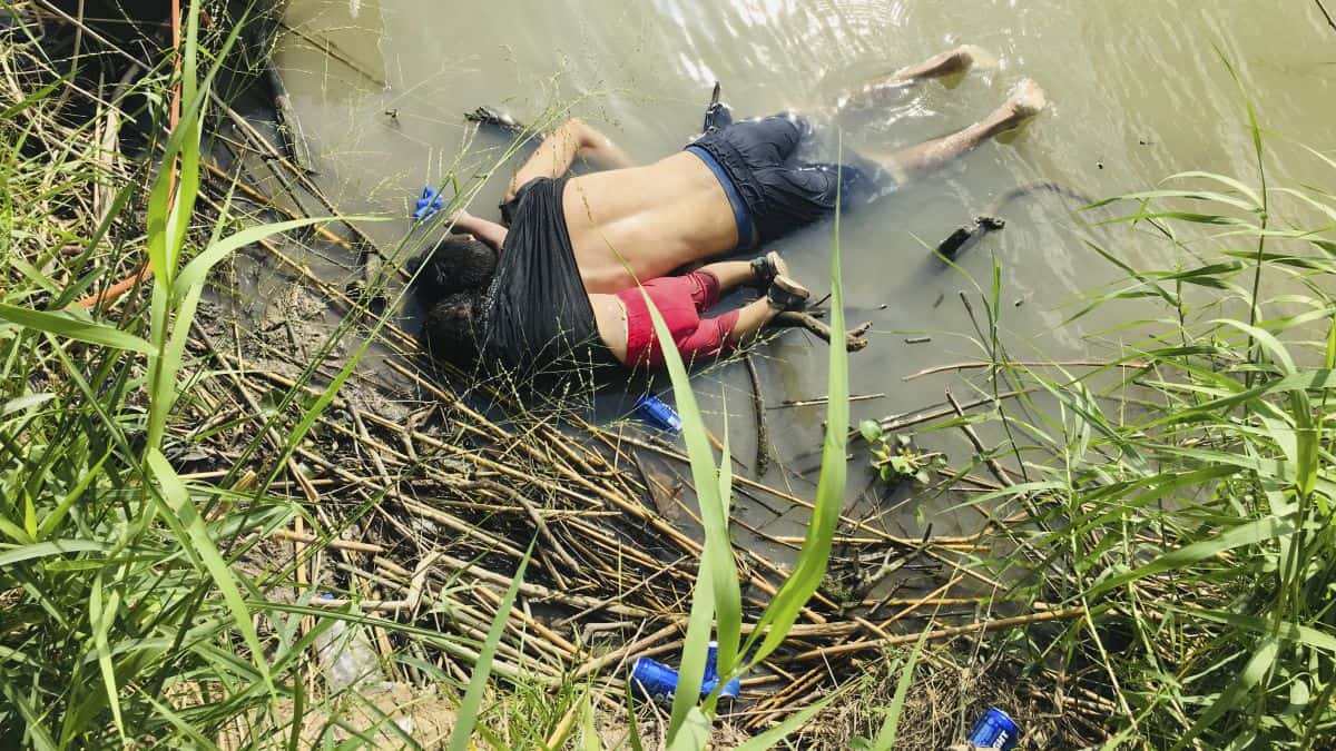 The bodies of Salvadoran migrant Oscar Alberto Martínez Ramírez and his nearly 2-year-old daughter Valeria lie on the bank of the Rio Grande in Matamoros, Mexico, on Monday