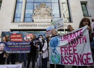 Supporters of WikiLeaks founder Julian Assange protest outside Westminster Magistrates' Court on Thursday