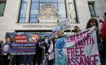 Supporters of WikiLeaks founder Julian Assange protest outside Westminster Magistrates' Court on Thursday
