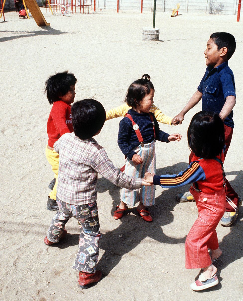 Children at St. Vincent's Home for Amerasian Children, for children of mixed American-Korean heritage, in the playground