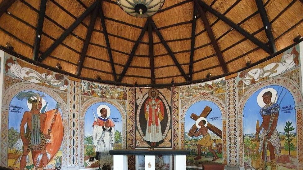 Murals above the altar at the Cyrene Mission Chapel, 2022