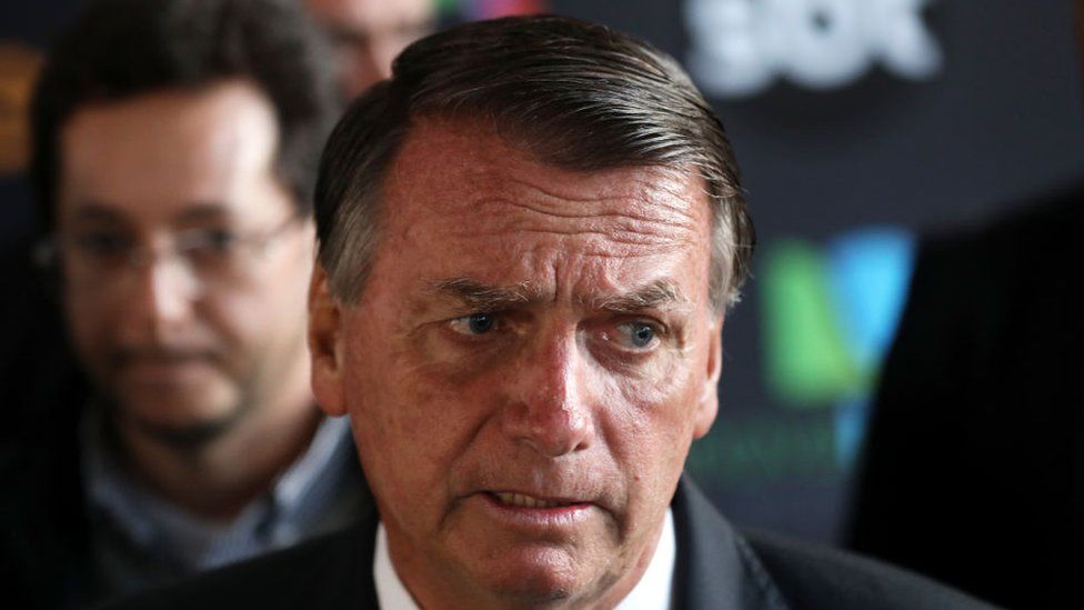 President of Brazil and current presidential candidate Jair Bolsonaro speaks to the media before a televised debate organized by a pool of local media at SBT Studios on September 24, 2022 in Sao Paulo, Brazil.