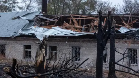 Reuters Damage from a Russian missile strike in Dnipro earlier this week