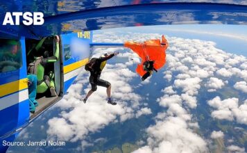 Skydiver left hanging at 4,500 metres after parachute snags on plane tail