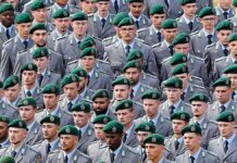 Europe needs to do 'much more' towards security, Germany's chancellor warns