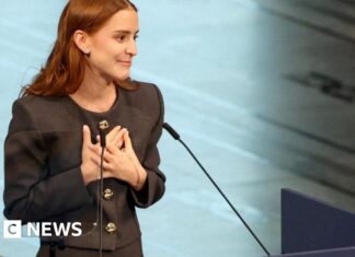 Nobel Peace Prize winner's daughter accepts award on her behalf