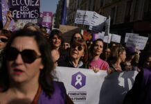 Thousands march in Paris for women’s rights, led by rape survivor Gisèle Pelicot