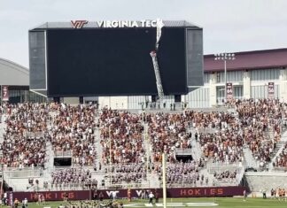Watch: Skydiver crashes into stadium scoreboard in Virginia