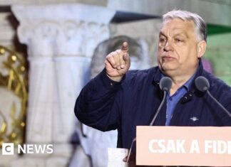 Hungarians decide whether to end 16 years of Orbán rule and elect rival