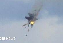 Moment two fighter jets collide mid-air at US air show
