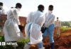 'I buried my parents one day after the other' – Ebola mourners learn how to grieve safely