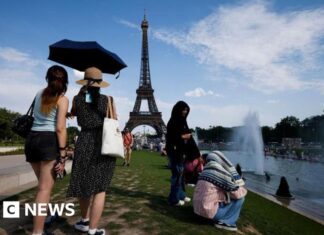 Half of France under red heat alert as alcohol banned at street music festival