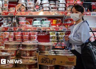 Japan raises interest rate to highest since 1995