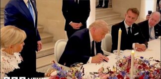 Moment Trump signs US-Iran agreement at Palace of Versailles