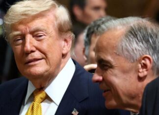 Trump slaps 50% tariffs on Canada and Carney vows to 'intensify' trade talks