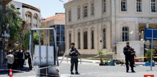 Bomb explosions injure 18 in Damascus during Macron's visit