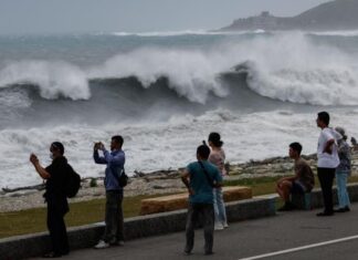 East Asia braces for destructive typhoon as landslides kill 15 in Philippines