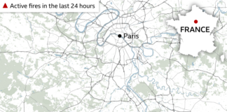 Wildfire raging south of Paris could have been set deliberately, says minister